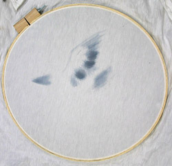 Beginnings of bird outline sketched in with pale indigo